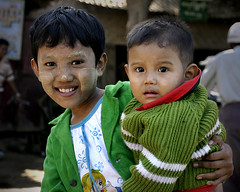 Burma - village - girl w baby brother